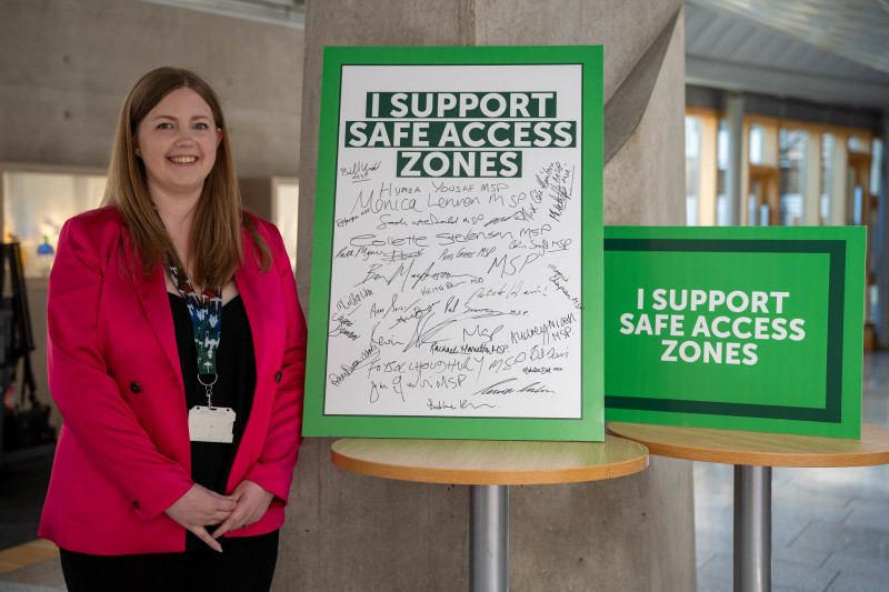 Gillian Mackay with board of supportive signatures