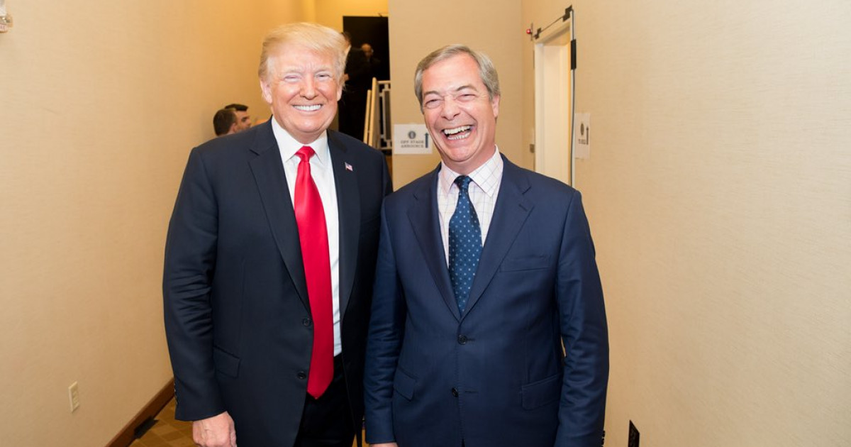 Nigel Farage and Donald Trump standing together smiling at the camera.